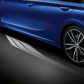 BMW 3 Series, Welcome Light Carpet. Detailed side view of the open driver's door with Welcome Light Carpet.