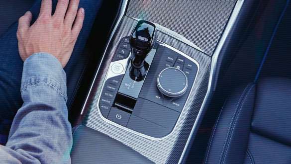 BMW 3 Series, Steptronic Sport transmission. Detailed bird's eye view of the centre console of the BMW 3 Series with gear lever and Steptronic Sport transmission.