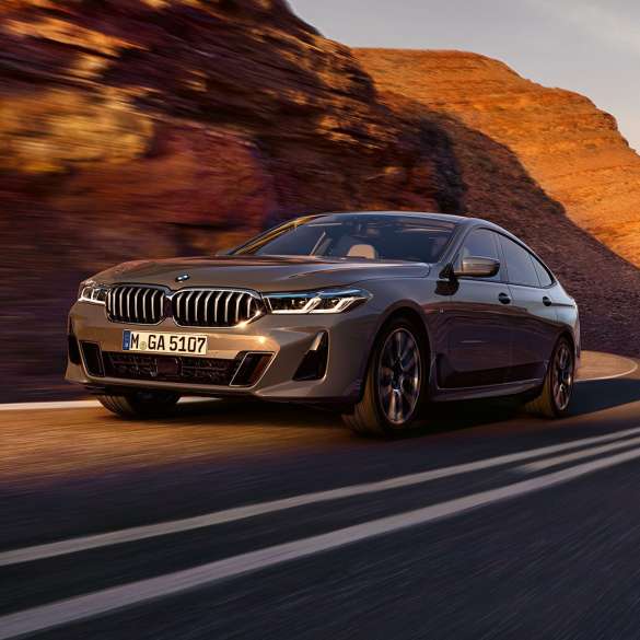 BMW 6 Series BMW 6 series 640i xDrive Bernina Grey in three-quarter front driving in front of landscape