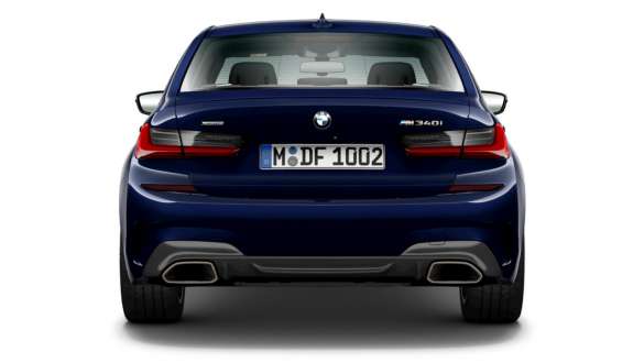 Exclusive tailpipe trims BMW M340i xDrive Sedan Exclusive tailpipe trims BMW M340i xDrive Sedan G20 Sapphire Black metallic rear view