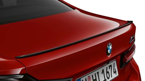 M rear spoiler in Black high-gloss BMW M5 Competition F90 2020 M rear spoiler in Black high-gloss BMW M5 Competition F90 LCI Facelift 2020 BMW Individual Imola Red close-up tailgate