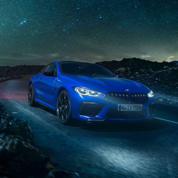 BMW M8 Coupé. The first-ever BMW M8 Coupé in Marina Bay Blue metallic, three-quarter front view.