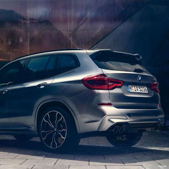 BMW X3 M Competition, lateral rear view. BMW X3 M Competition in Donington Grey metallic, exterior, lateral rear view.