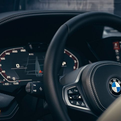 BMW assistance systems. Close-up of the BMW interior with focus on Instrument cluster.