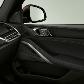 BMW X6 speaker. Close-up of the BMW interior with focus on speaker.
