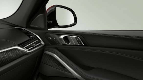 BMW X6 speaker. Close-up of the BMW interior with focus on speaker.