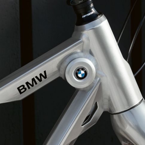The picture shows a BMW Cruise Bike. The BMW logo and the BMW wordmark are clearly visible on the front part of the frame. The picture shows a BMW Cruise Bike. The BMW logo and the BMW wordmark are clearly visible on the front part of the frame.