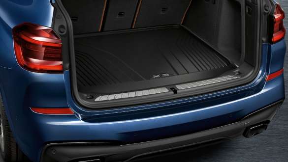 BMW Luggage compartment mat BMW Luggage compartment mat: open luggage compartment of a blue BMW