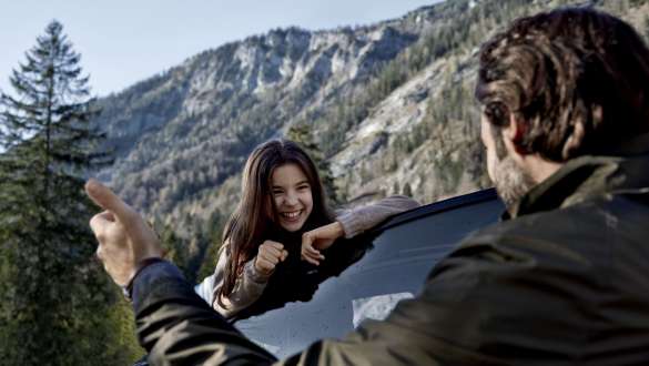 Laughing girl in front of mountain view Laughing girl in front of mountain view