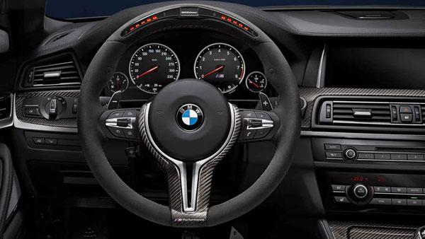 M Performance Alcantara steering wheel with carbon trim and race display