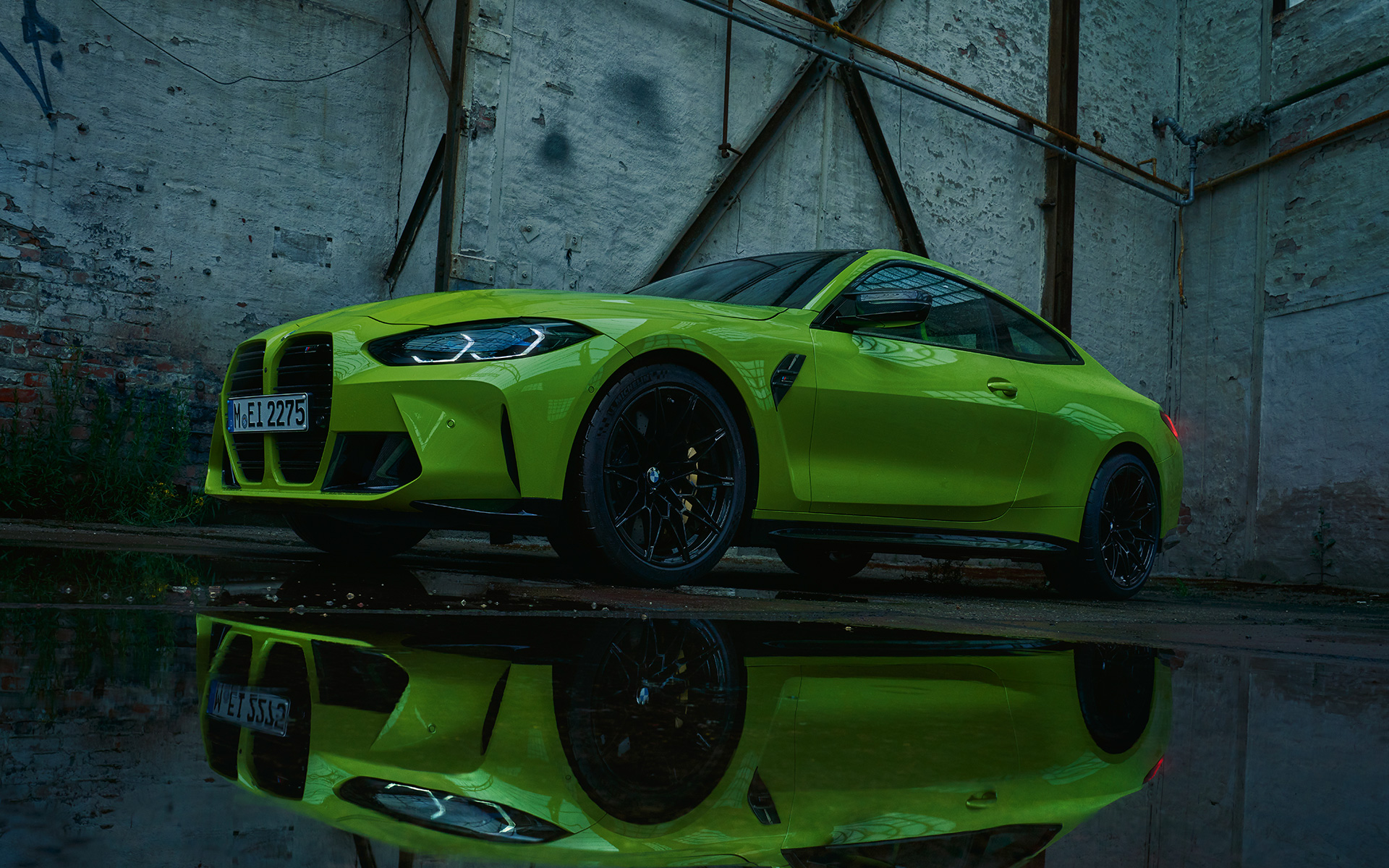 BMW M4 Competition Coupé with M xDrive Sao Paulo Yellow three-quarter front view 