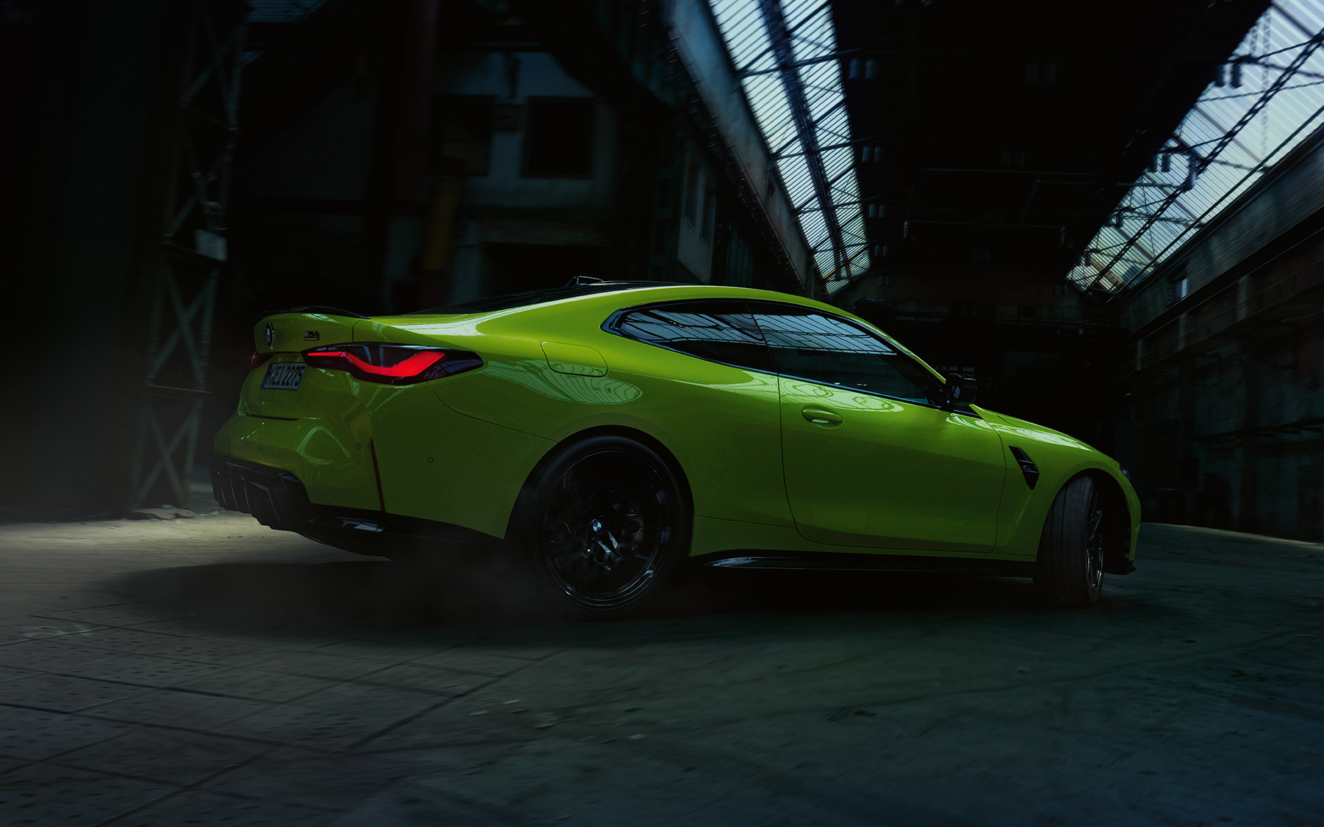 BMW M4 Competition Coupé with M xDrive Sao Paulo Yellow three-quarter side view 