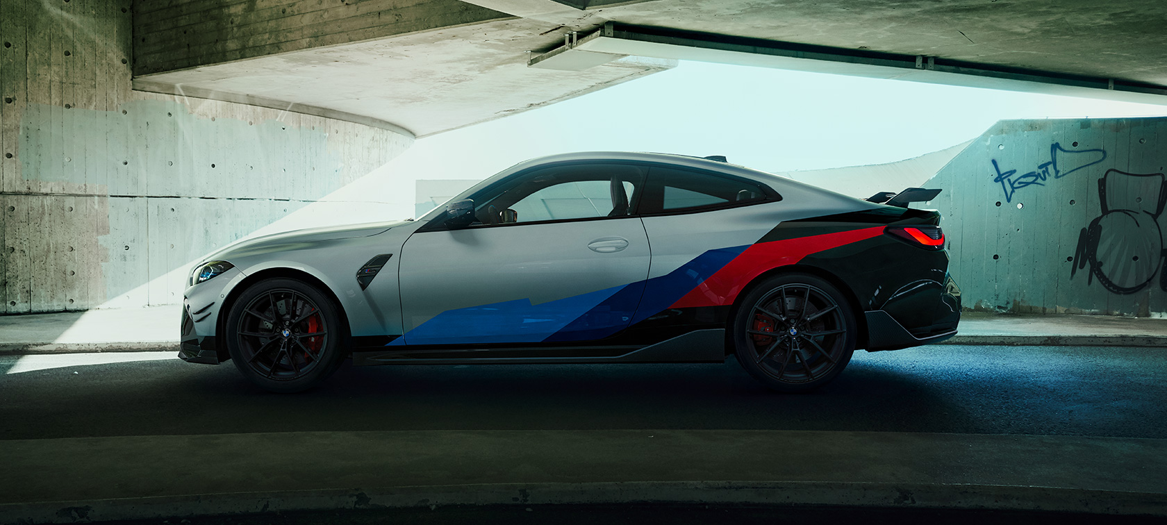 BMW M4 Competition Coupé with M xDrive with BMW M Performance Parts BMW M4 Competition Coupé with M xDrive side view with BMW M Performance Parts