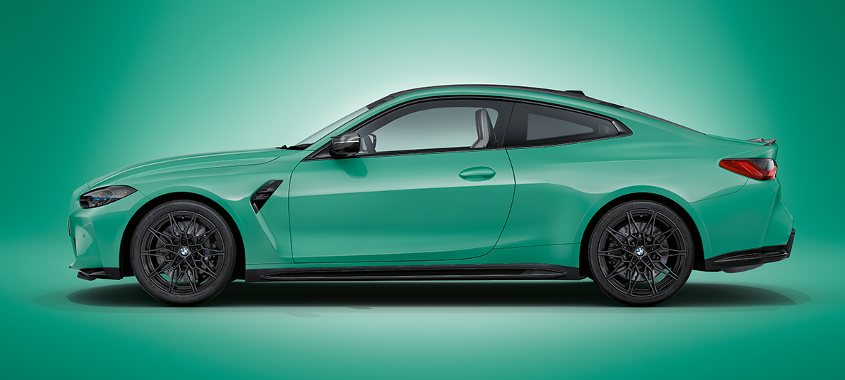 BMW M4 Competition Coupé with M xDrive side view standing BMW M4 Competition Coupé with M xDrive side view standing