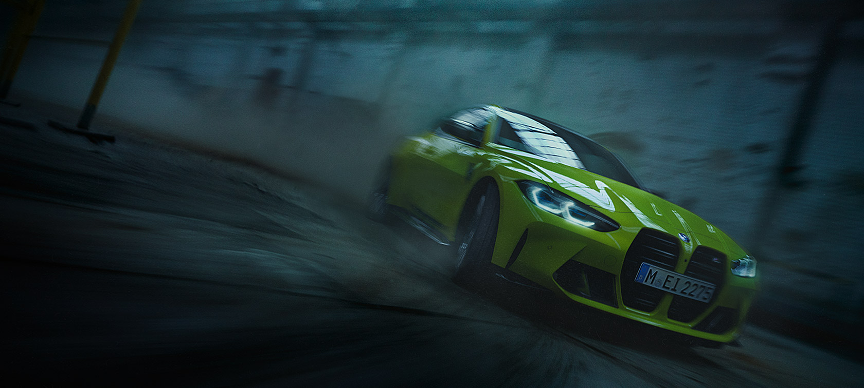 BMW M4 Competition Coupé with M xDrive Sao Paulo Yellow three-quarter front view in motion