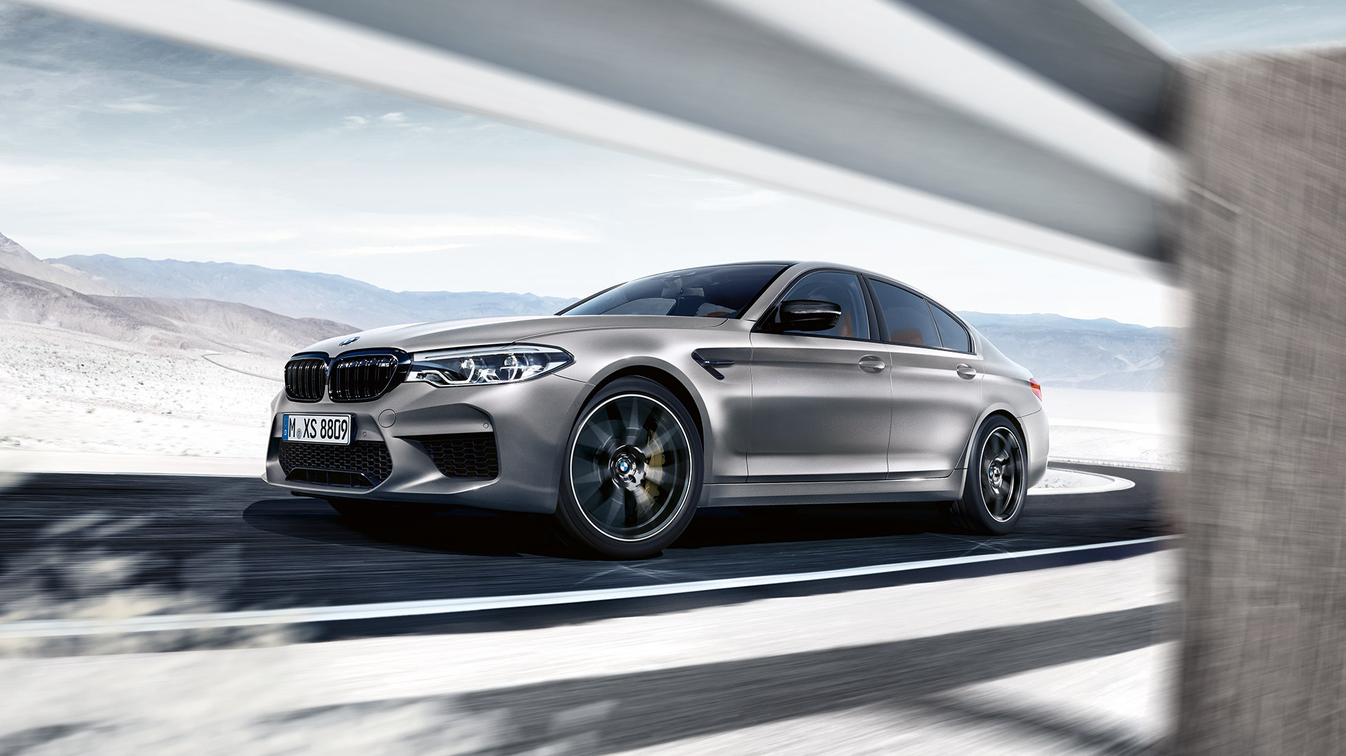 Light alloy wheels. BMW M5 Competition design side shot.