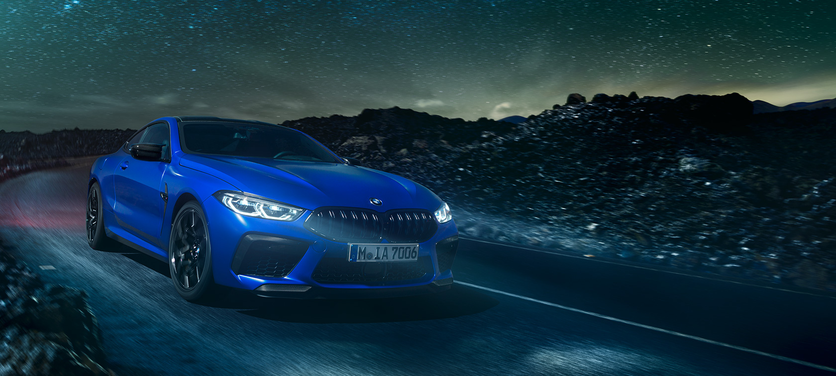 The BMW M8 Coupé. The first-ever BMW M8 Coupé in Marina Bay Blue metallic, three-quarter front view.