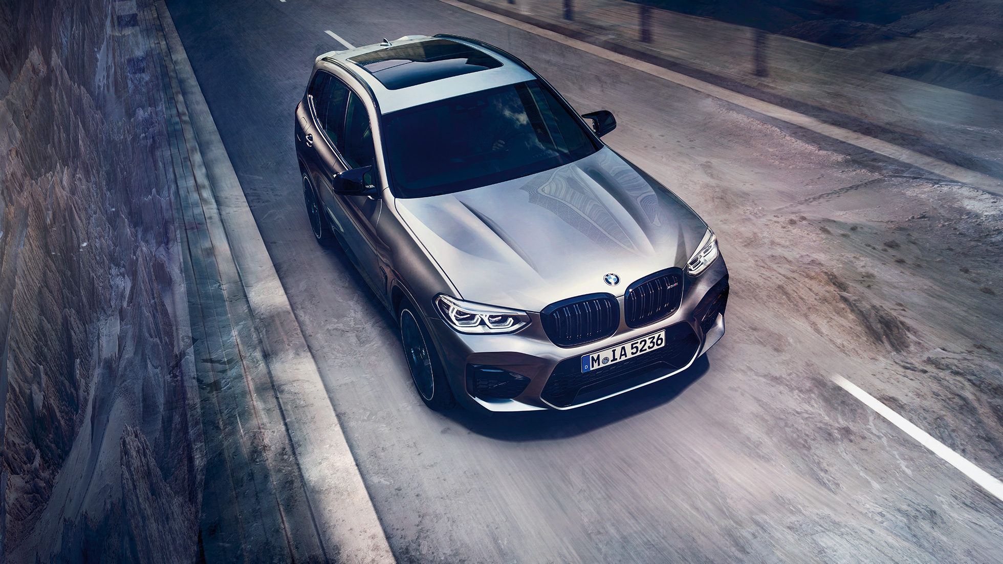 BMW X3 M, bird’s eye view. BMW X3 M in Donington Grey metallic, exterior, bird’s eye view of front.