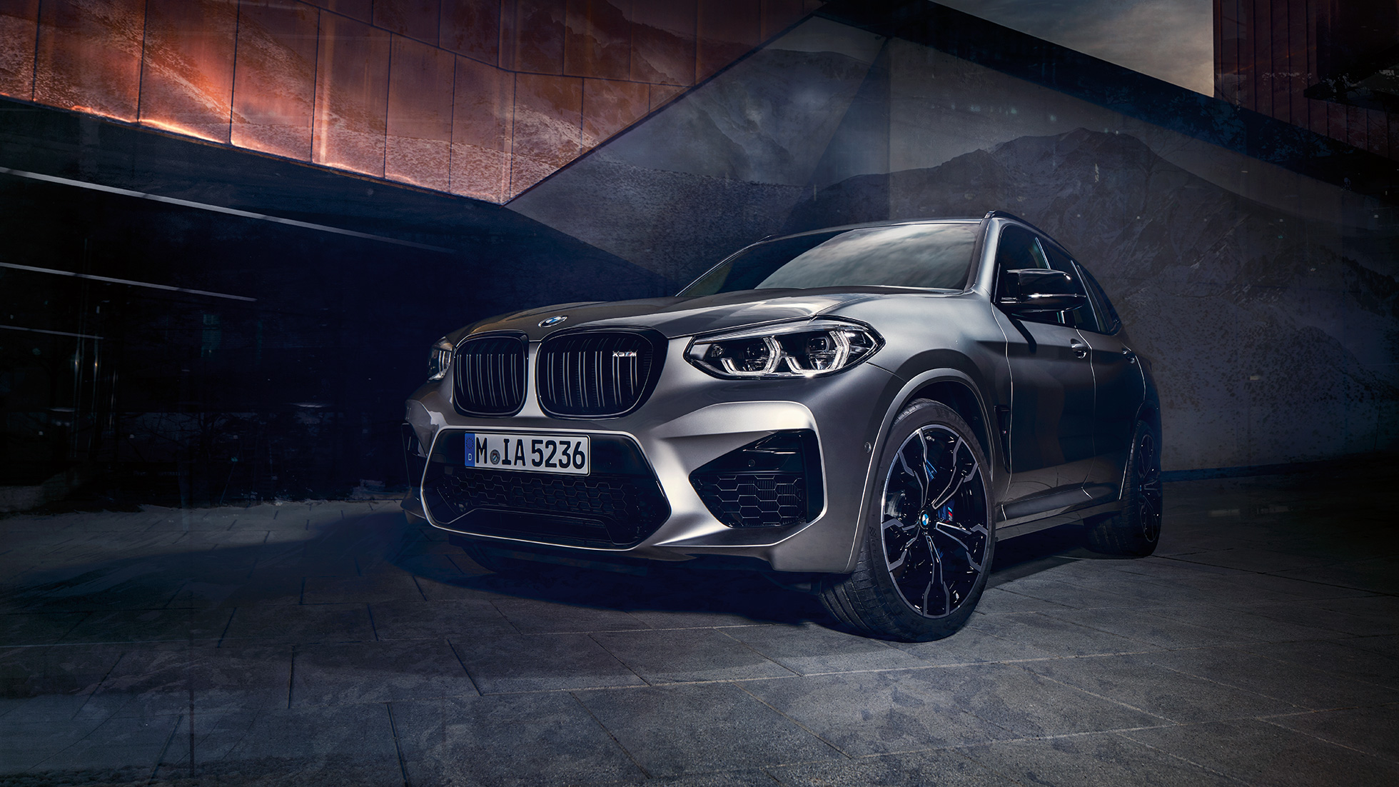 BMW X3 M, three-quarter front view. BMW X3 M in Donington Grey metallic, exterior, three-quarter front view.