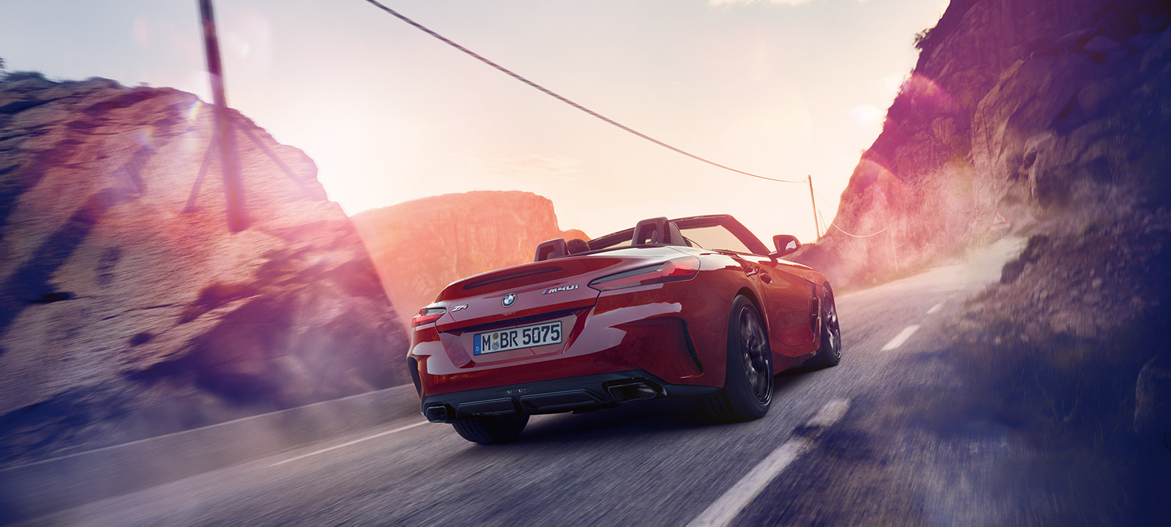 BMW Z4 Roadster driving through mountains