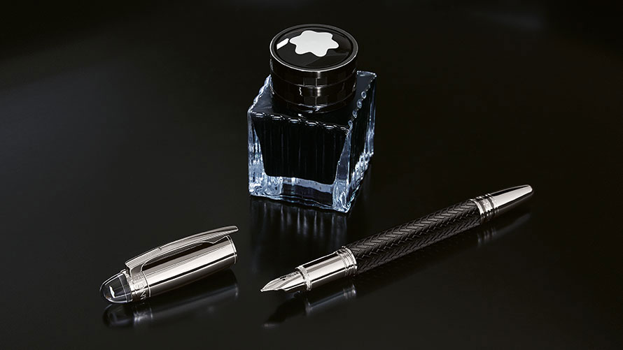 The Montblanc for BMW Fountain Pen is seen lying in front of the Montblanc for BMW Ink Bottle.