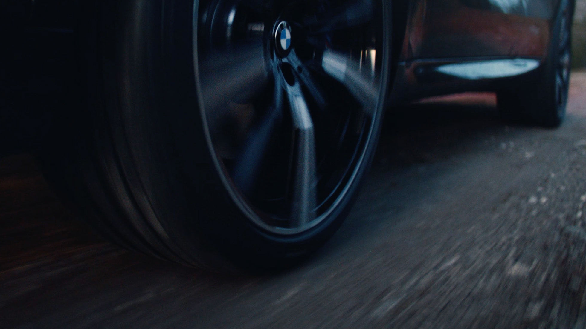 Rotating BMW rim with BMW logo Rotating BMW rim with BMW logo