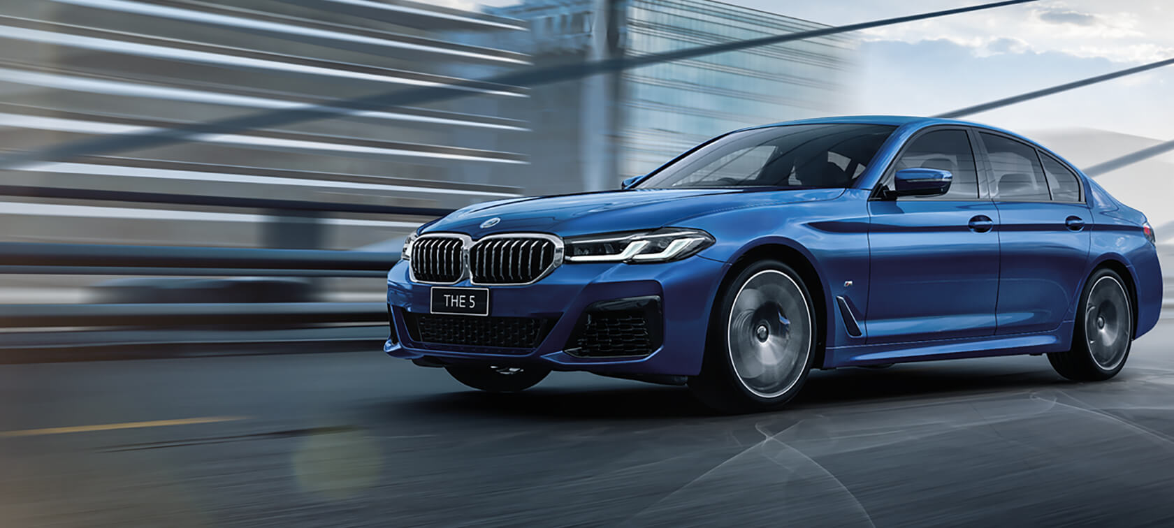 BMW 5 Series Sedan G30 Facelift 2020 Phytonic Blue three-quarter front view driving