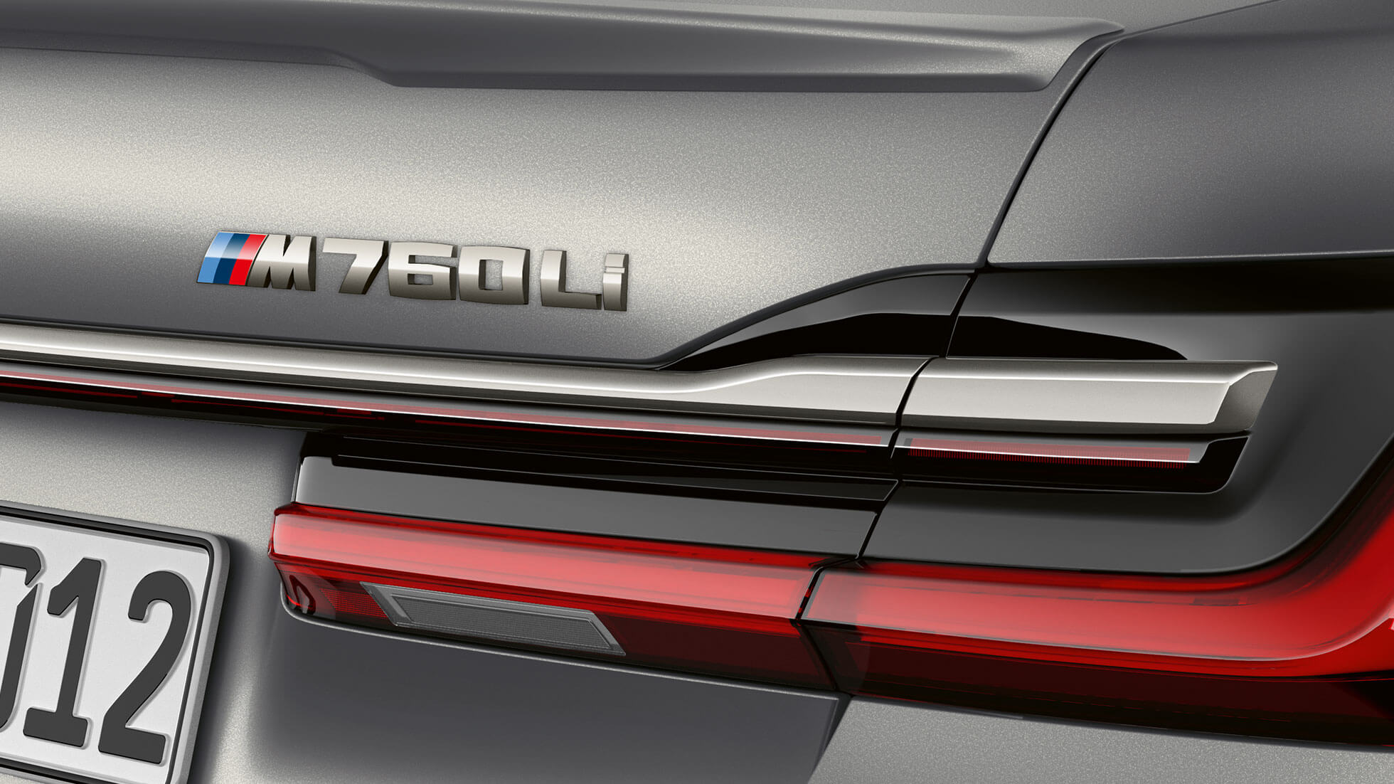 BMW 7 Series Sedan: close-up of BMW M760Li badge BMW 7 Series Sedan: close-up of BMW M760Li badge on the rear